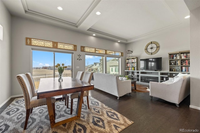 dining room with baseboards, dark wood-style flooring, and recessed lighting