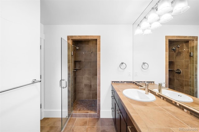 1934 S Sherman St, Denver, CO 80210 - full bath featuring a shower stall, vanity, and tile patterned floors