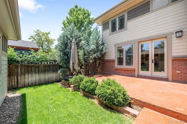 1934 S Sherman St, Denver, CO 80210 - view of yard with a patio and french doors