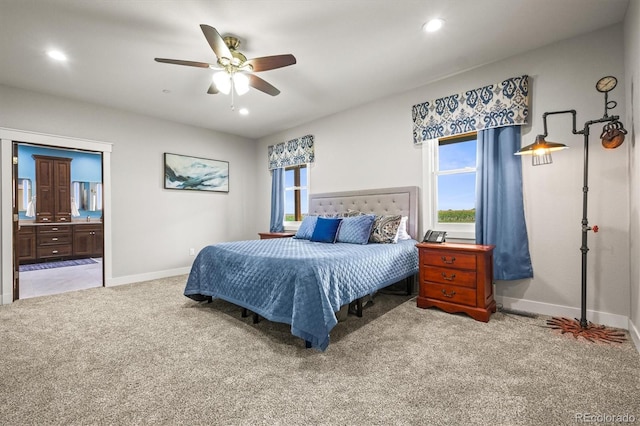 6331 County Road 32, Platteville, CO 80651 - carpeted bedroom with multiple windows, baseboards, recessed lighting, a ceiling fan, and ensuite bath