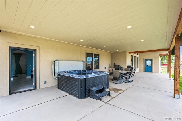 6331 County Road 32, Platteville, CO 80651 - view of patio featuring a hot tub and outdoor dining space