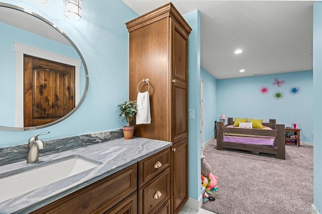 6331 County Road 32, Platteville, CO 80651 - bathroom with vanity and recessed lighting