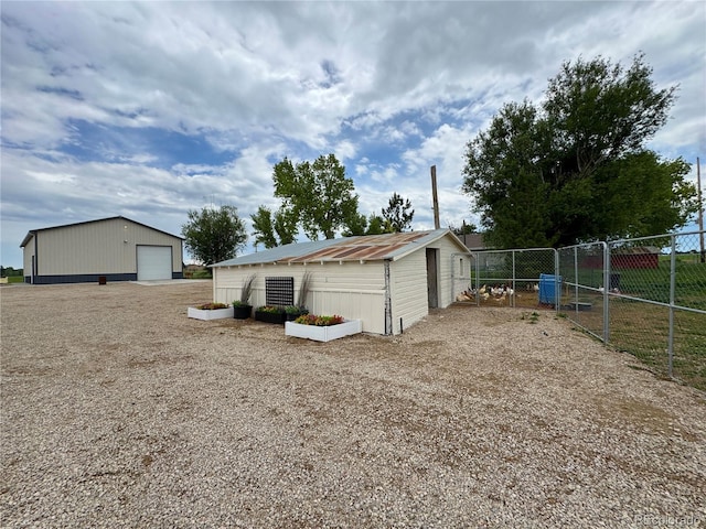 6331 County Road 32, Platteville, CO 80651 - exterior space featuring a garage and an outdoor structure