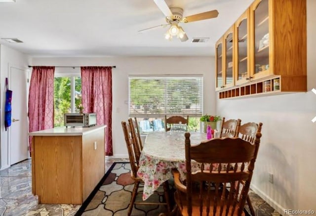 dining room with ceiling fan