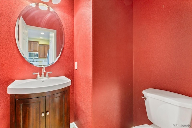 1284 Timber Run Hts, Monument, CO 80132 - half bath featuring vanity and a textured wall