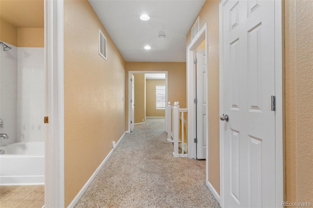 1284 Timber Run Hts, Monument, CO 80132 - corridor featuring a textured wall, carpet floors, and recessed lighting
