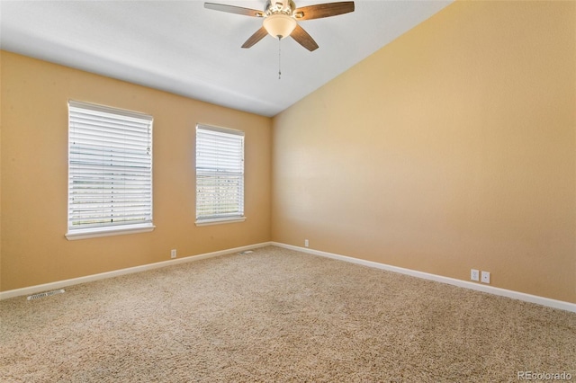 1284 Timber Run Hts, Monument, CO 80132 - spare room with lofted ceiling, a ceiling fan, and carpet floors