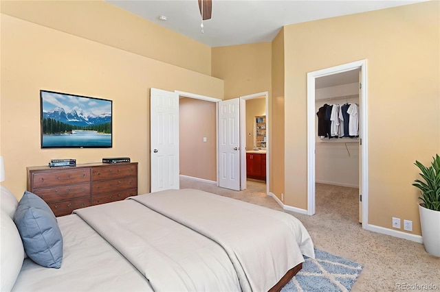 1284 Timber Run Hts, Monument, CO 80132 - carpeted bedroom with a spacious closet, a closet, high vaulted ceiling, and ceiling fan