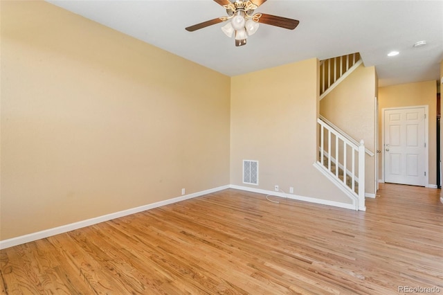 1284 Timber Run Hts, Monument, CO 80132 - empty room with stairway, light wood-style flooring, ceiling fan, and recessed lighting