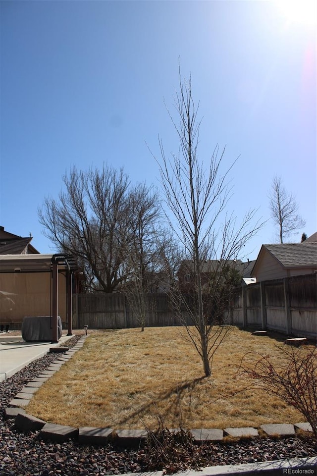 view of yard featuring fence