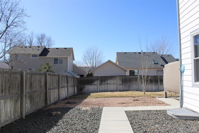 view of yard featuring a fenced backyard