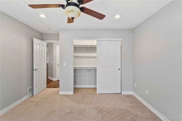 unfurnished bedroom with recessed lighting, visible vents, carpet floors, and baseboards