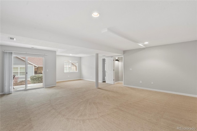 empty room with recessed lighting, light colored carpet, and baseboards