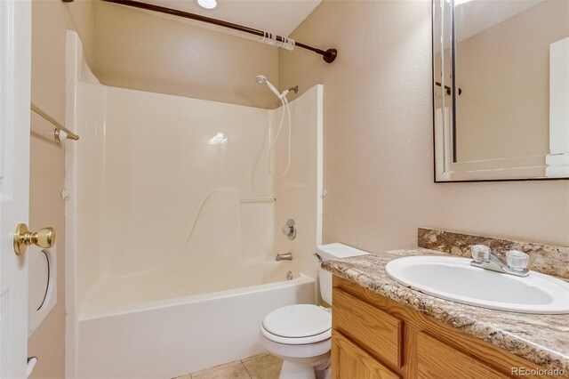 2035 Overland Dr, Brighton, CO 80601 - bathroom featuring toilet, vanity, bathtub / shower combination, and tile patterned flooring