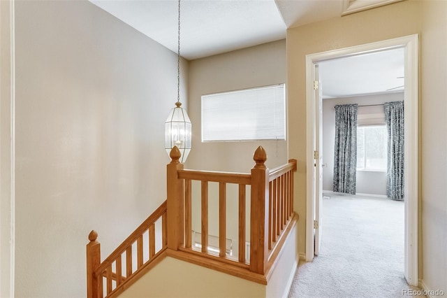 2035 Overland Dr, Brighton, CO 80601 - corridor featuring an upstairs landing and carpet floors