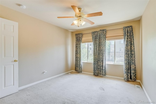 2035 Overland Dr, Brighton, CO 80601 - carpeted empty room with a smoke detector, a ceiling fan, and baseboards