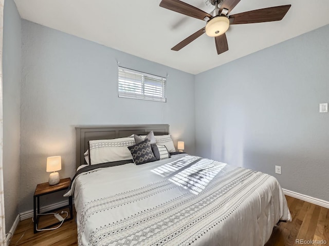 6664 Gray St, Arvada, CO 80003 - bedroom with wood finished floors and a ceiling fan