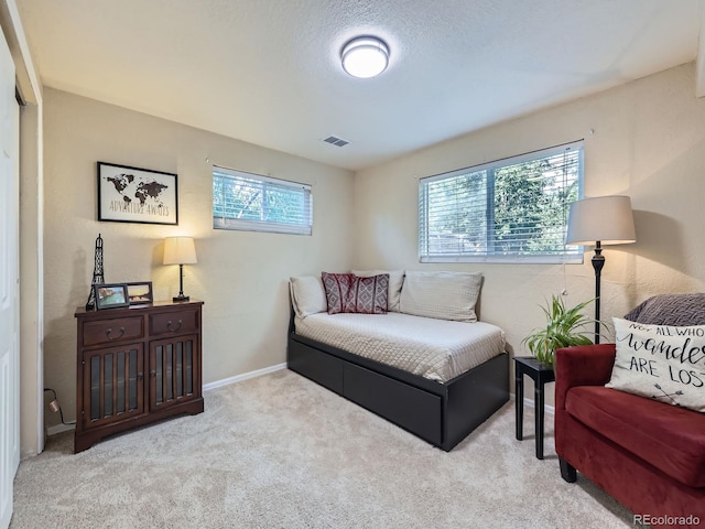 6664 Gray St, Arvada, CO 80003 - carpeted bedroom featuring multiple windows
