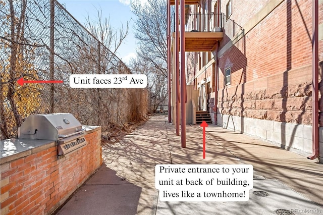 2351 Federal Blvd Unit 102, Denver, CO 80211 - view of patio featuring stairs