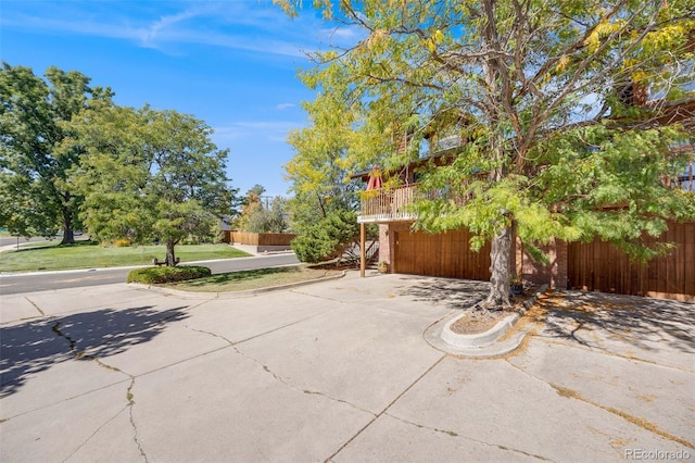 view of patio featuring fence