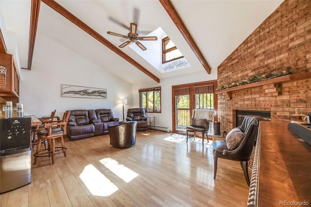 living area featuring beam ceiling, high vaulted ceiling, a ceiling fan, a baseboard radiator, and hardwood / wood-style flooring