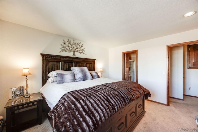 bedroom with baseboards, light carpet, and recessed lighting