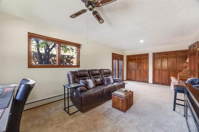 living room with ceiling fan, a textured ceiling, a baseboard radiator, light carpet, and recessed lighting