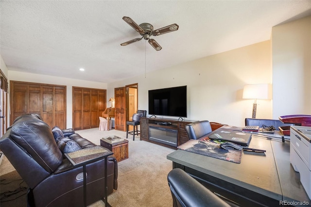 living room with recessed lighting, ceiling fan, and light carpet