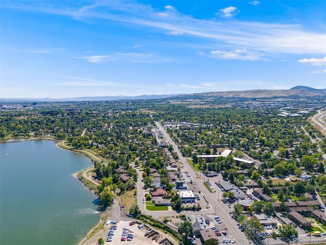 bird's eye view with a water and mountain view