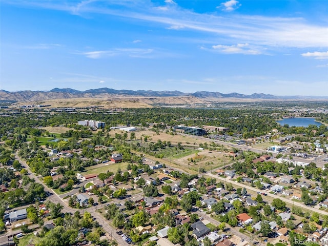 bird's eye view featuring a water and mountain view