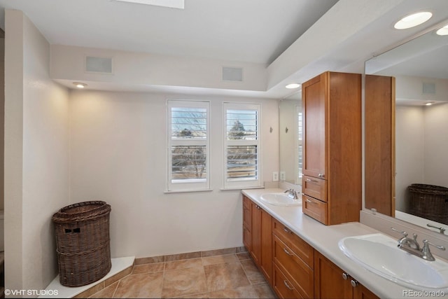 bathroom featuring tile patterned floors and vanity