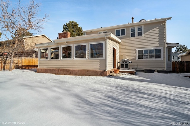 view of snow covered property