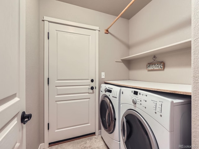 laundry area featuring laundry area and washing machine and dryer