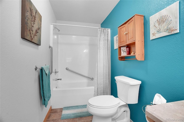 bathroom featuring shower / bath combo with shower curtain and toilet