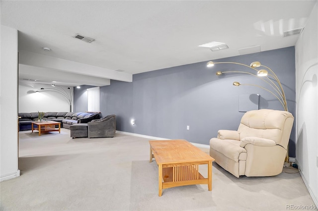 living room with light carpet, baseboards, and visible vents