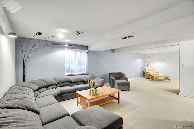 living room featuring light carpet, baseboards, and visible vents