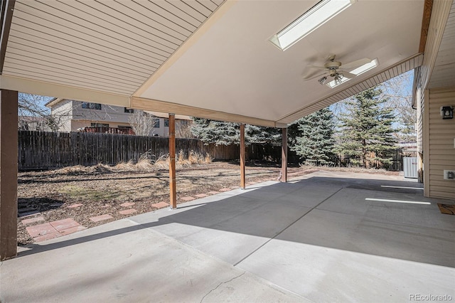 view of patio featuring ceiling fan, central air condition unit, and a fenced backyard