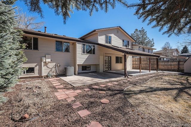 back of house with a patio area, central AC unit, and fence