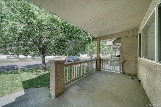 view of patio featuring a porch