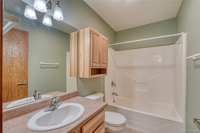 full bathroom featuring toilet, vanity, and shower / washtub combination