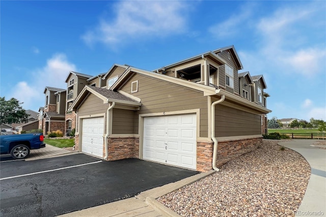 view of home's exterior with a garage