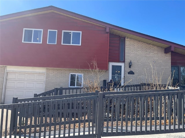 1473 S Monaco Pkwy S, Denver, CO 80224 - view of front of home with brick siding