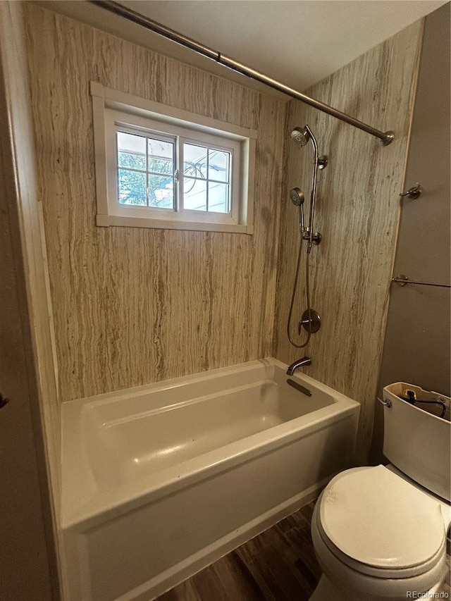 8319 Quivas Way, Denver, CO 80221 - bathroom featuring bathing tub / shower combination and wood finished floors