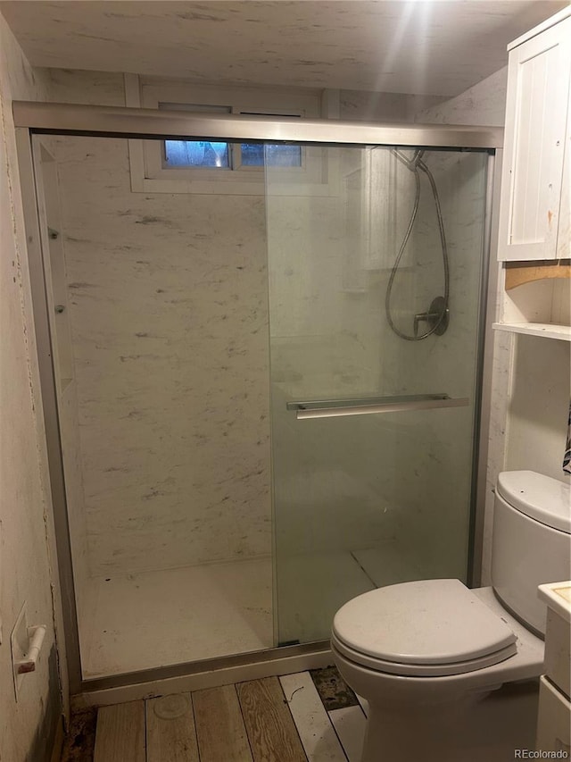 8319 Quivas Way, Denver, CO 80221 - full bath featuring vanity, a shower stall, and wood finished floors