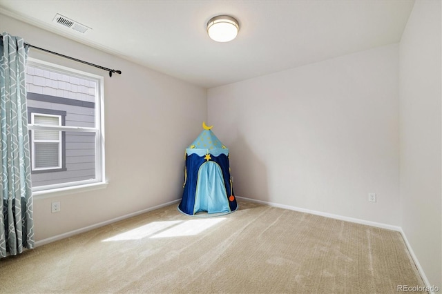 game room with baseboards, visible vents, and carpet