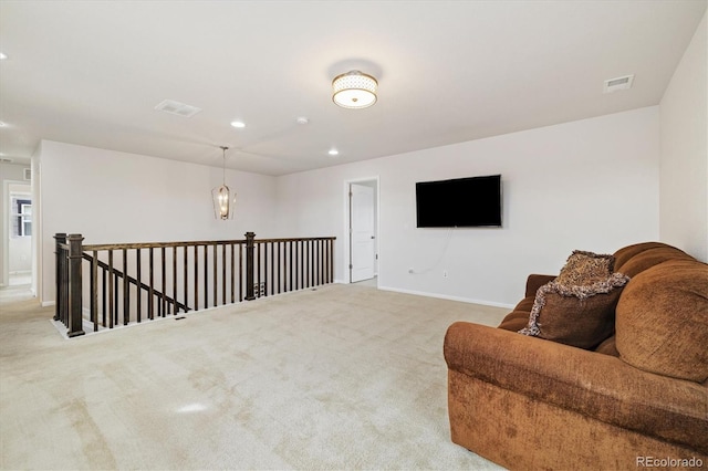 10913 Ledges Rd, Parker, CO 80134 - sitting room with carpet floors, an upstairs landing, and recessed lighting