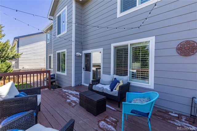 deck featuring outdoor lounge area