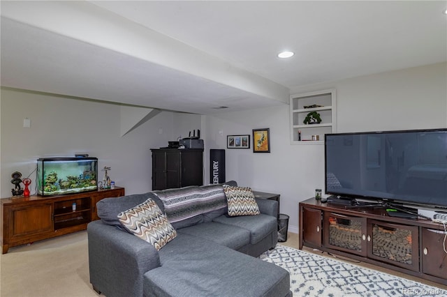 living area featuring built in features, recessed lighting, and light colored carpet