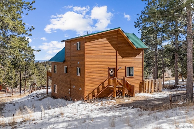 view of snow covered property