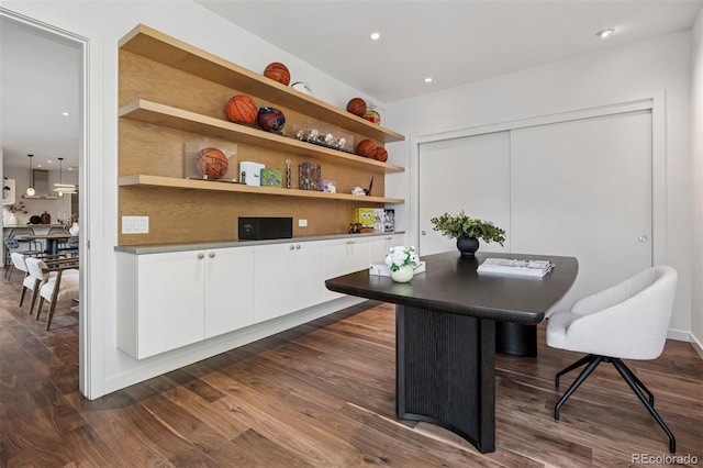 interior space featuring recessed lighting and dark wood-style flooring